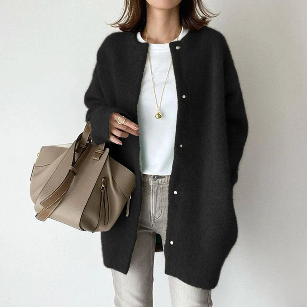 A cozy, knitted cardigan jacket in a variety of colors and sizes, featuring a relaxed open-front silhouette and premium construction for versatile layering.