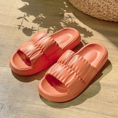 Comfortable and stylish women's bathroom slides in various vibrant colors and patterns