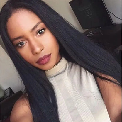 Long black straight synthetic wig on a stand, showing centre parting and full fringe