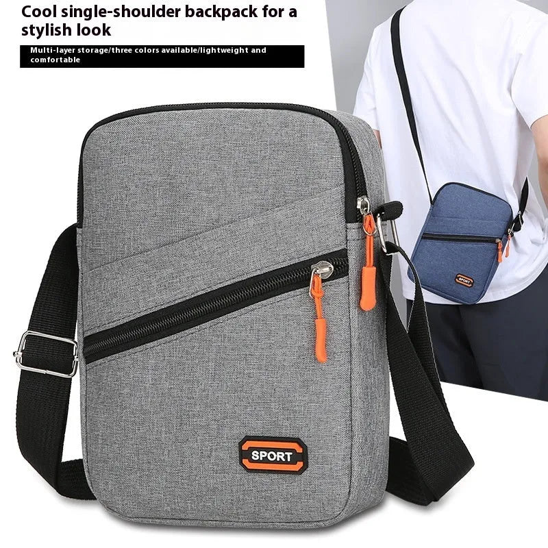 Oxford cloth crossbody commuter bag with contrast colour trim in silver grey