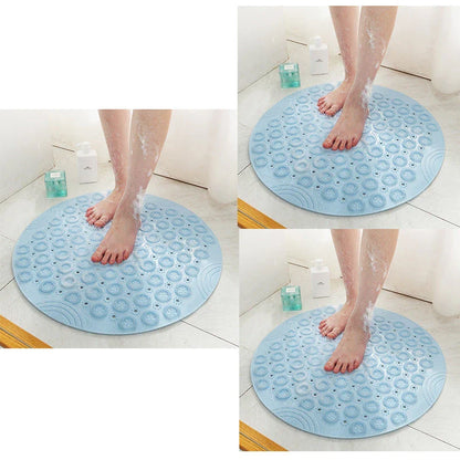 Textured round shower mat with anti-slip surface, massage nodules, and drainage holes for a comfortable and safe bathing experience