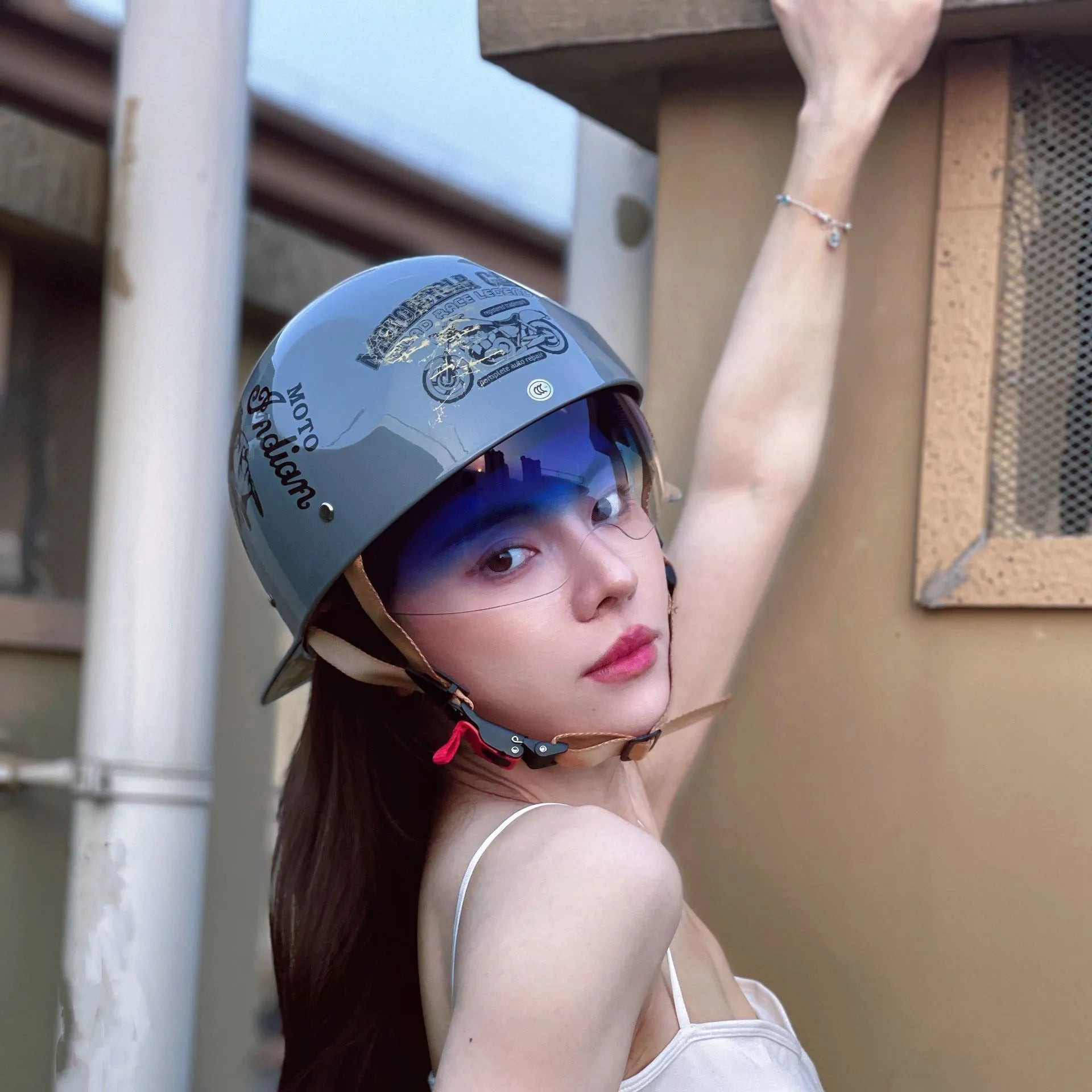 Electric bicycle helmet in bright black gradient blue colour with blue lens, retro half helmet design
