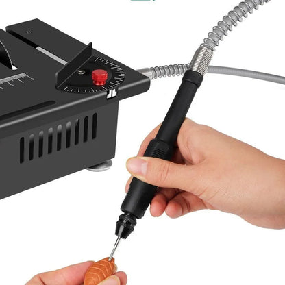 Lithium-ion battery-powered handheld desktop saw with metal body on a workbench.