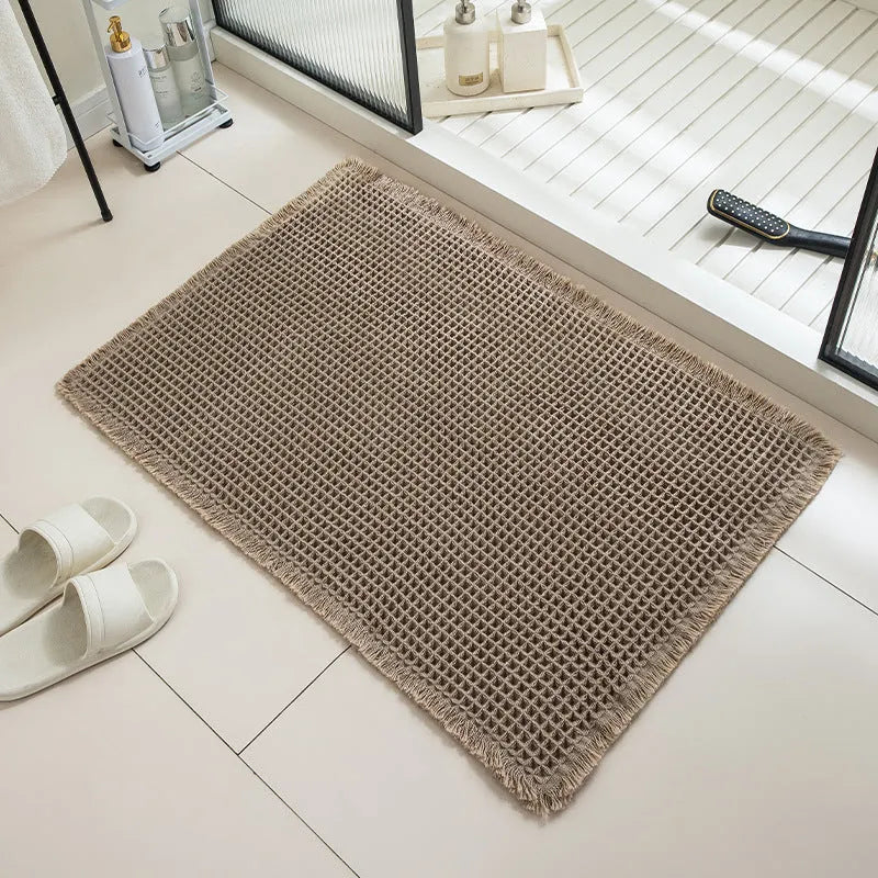 Checkered pattern non-slip bathroom carpet in beige colour with woven polyester construction