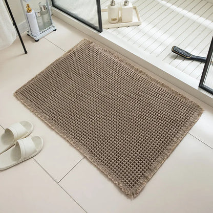 Checkered pattern non-slip bathroom carpet in beige colour with woven polyester construction