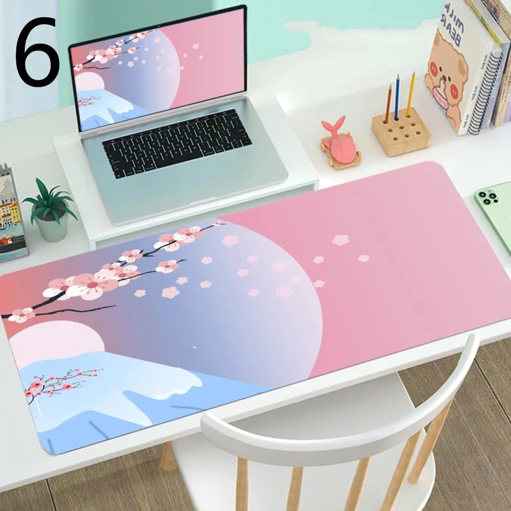 Large gaming mouse mat with printed design on rubber base, multiple size options from 300x600mm to 400x900mm