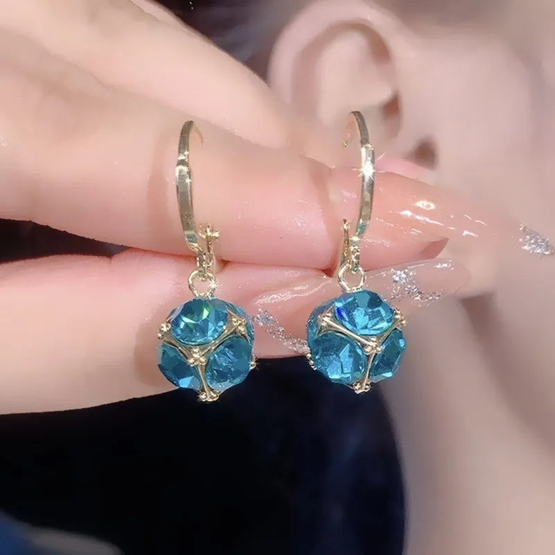 Geometric rose design copper earrings with zircon details in multiple colour options