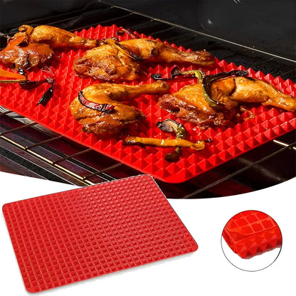 Red silicone pyramid grid cooking mat on a kitchen counter