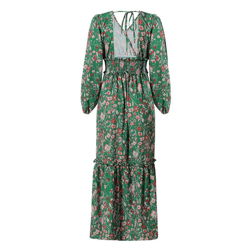 A green halter dress with a vibrant printed pattern and lantern sleeves.