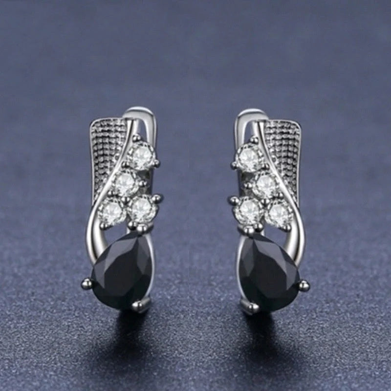 Elegant black drop-shaped rhinestone earrings for women, perfect for adding sparkle to any outfit.
