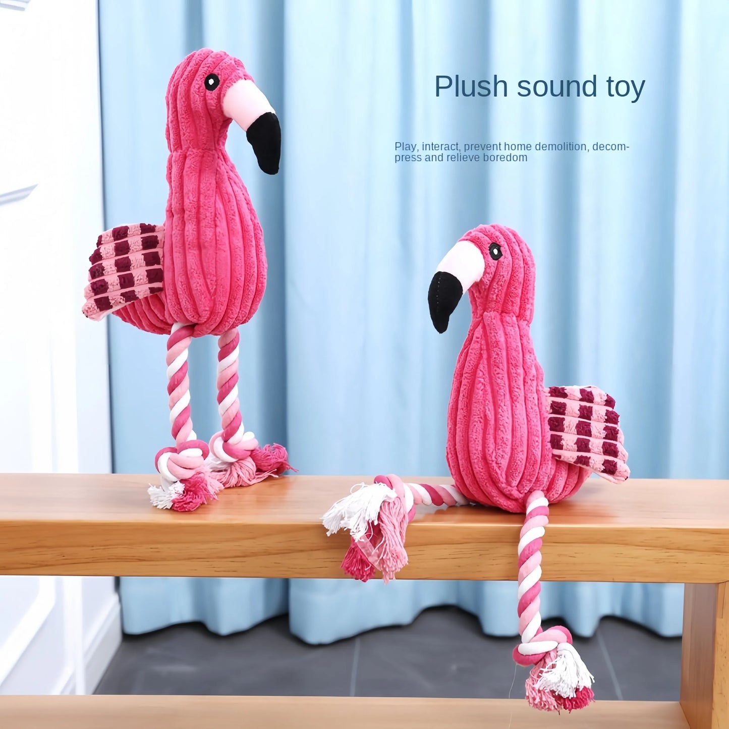 Four pink animal-shaped corduroy dog toys with squeakers arranged together