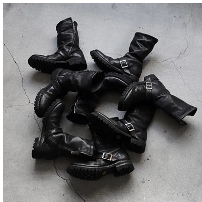 Men's dark retro Martin ankle boots with a zip fastener and round toe in black.