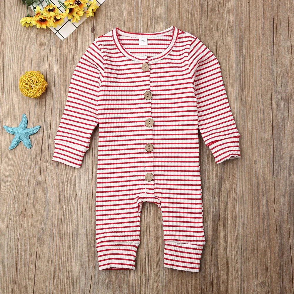 Newborn wearing a striped knitted jumpsuit in cotton, sizes 70-100cm, available in six colours