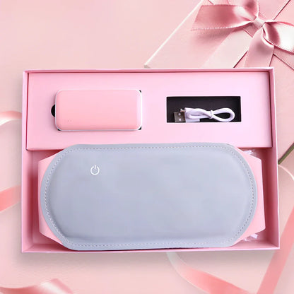 Pink Warm Heart Heating Belt with temperature control buttons and LED indicators on Lycra fabric surface