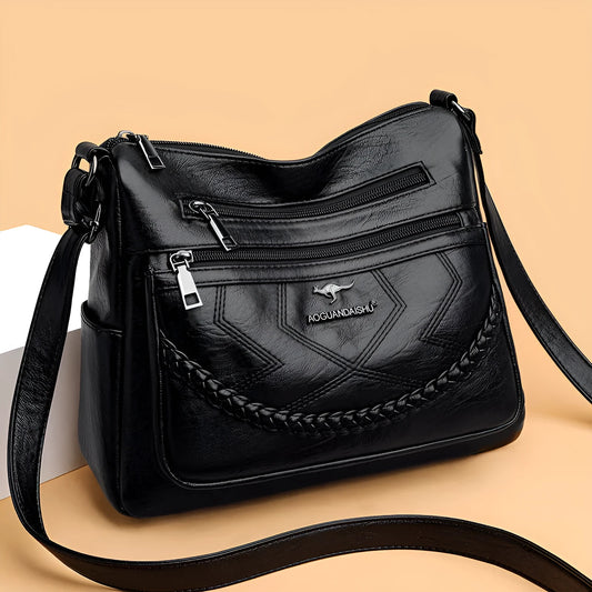 Soft leather fashion shoulder bag in horizontal square design with multiple internal pockets