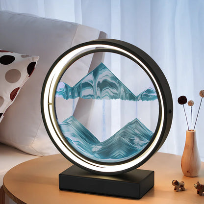 Black and white quicksand table lamp, 295mm tall with LED lights and remote control, coloured sand in glass chamber