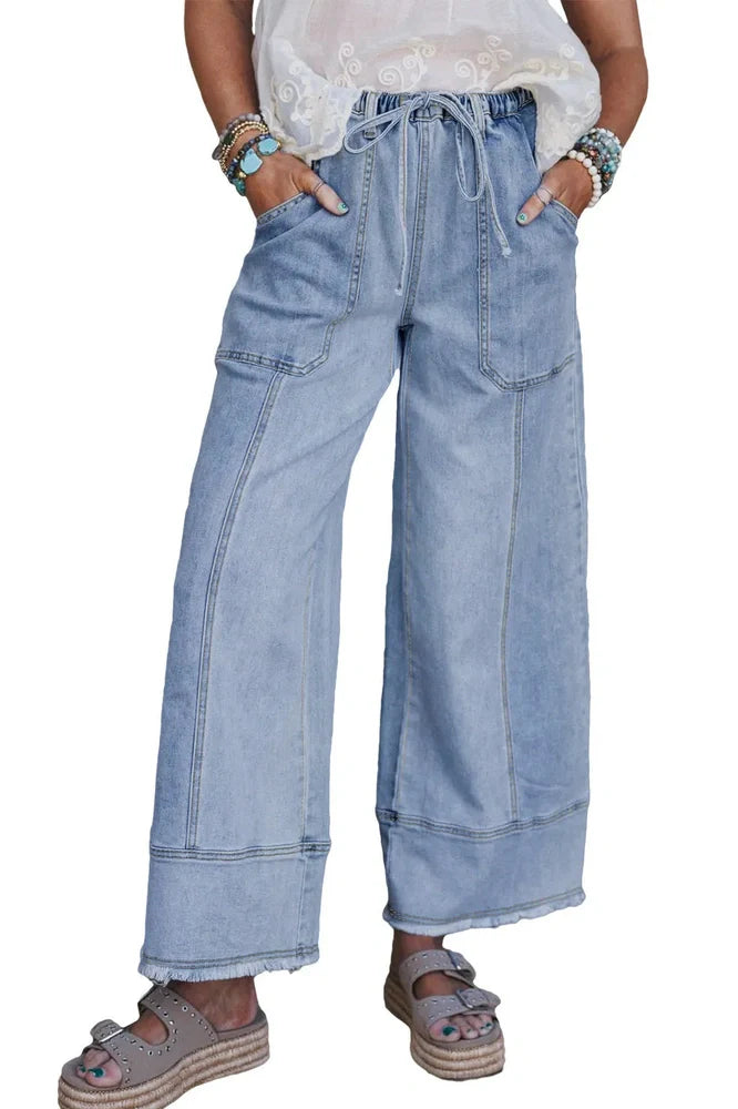 Beau Blue wide leg denim trousers with drawstring waist detail and raw hem finish