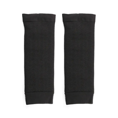 Women's black nylon shaping arm sleeve, free size, laid flat.