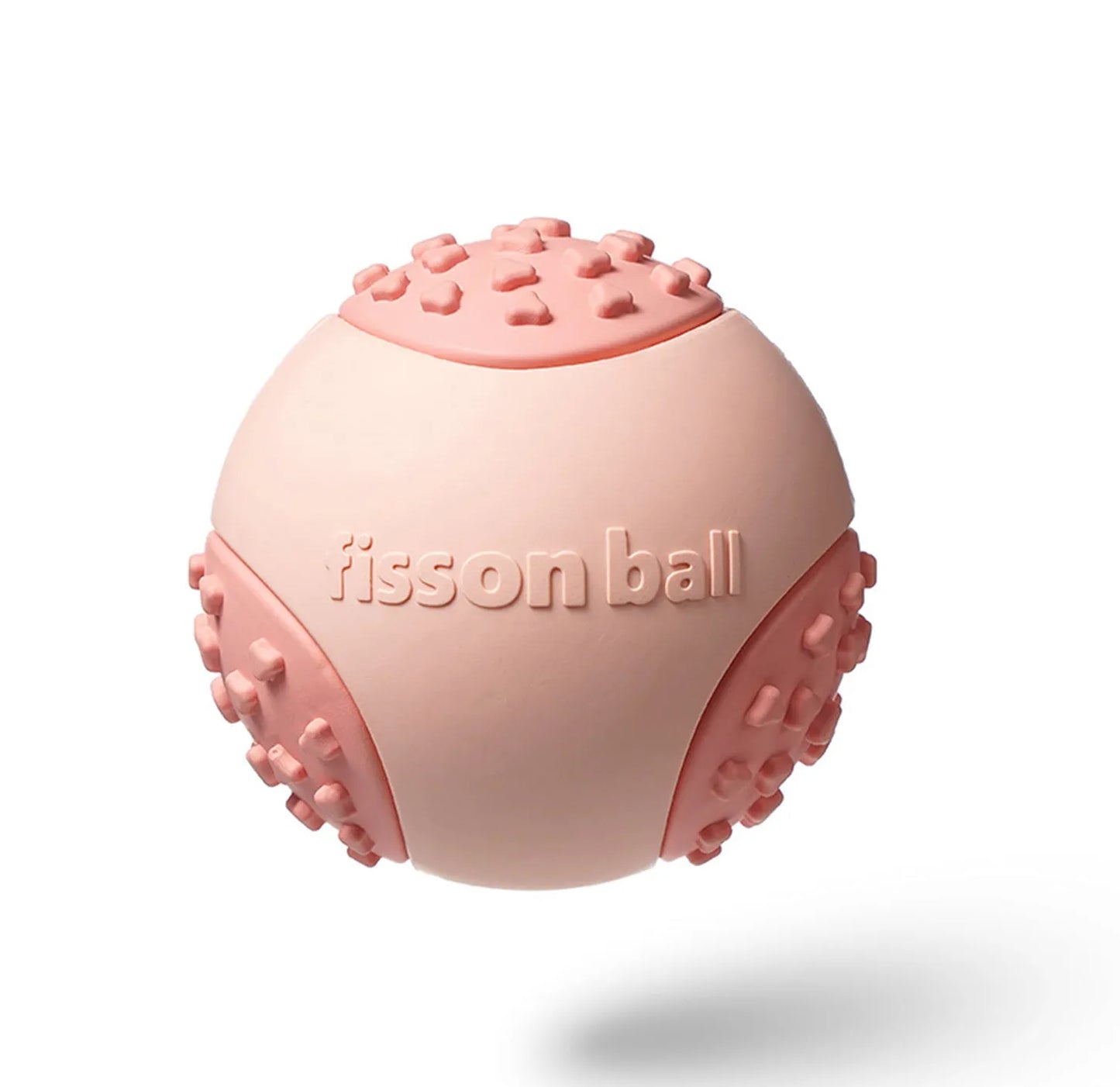 Green rolling ball dog toy with 64mm diameter for small to medium breeds on floor