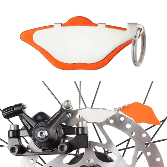 Mountain bike disc brake linings with scratch-proof grinding discs in black and orange options