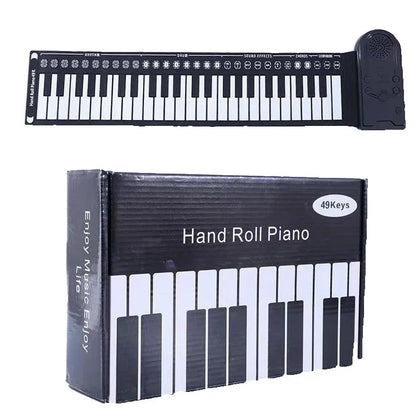 49-key folding electronic keyboard in gloss black with built-in speaker, unfolded to show silicone rubber keys and ABS plastic control panel