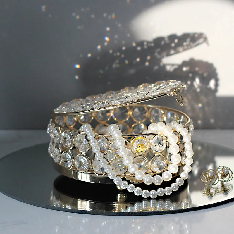 French gold iron jewellery box with crystal glass panels showing jewellery inside
