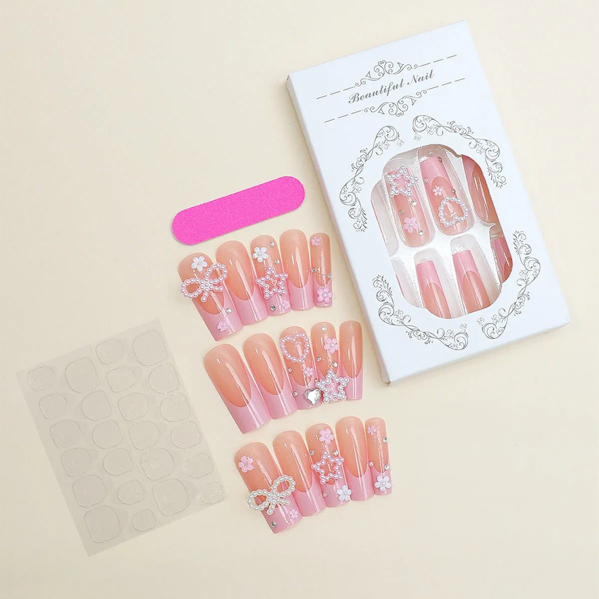 Nail art set showing super long water pipe French spot drill designs with a bow and love pattern in colour XB-70-48.