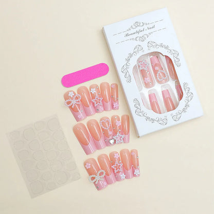 Nail art set showing super long water pipe French spot drill designs with a bow and love pattern in colour XB-70-48.