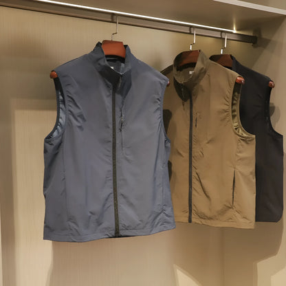 Men's navy blue quick-dry nylon vest cardigan with side pockets on a hanger