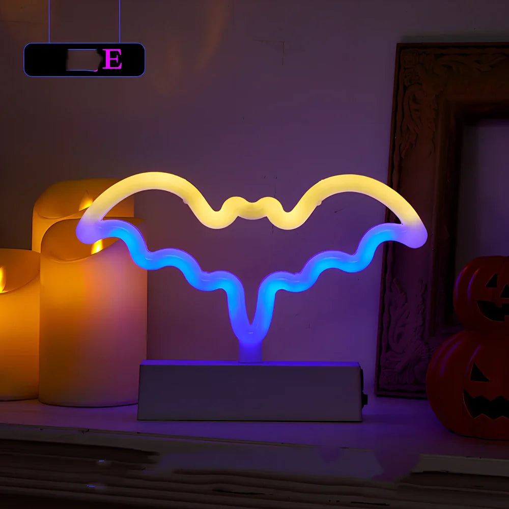 Set of nine glowing Halloween pumpkin lanterns in varying sizes from 14.5cm to 23cm height with plastic construction