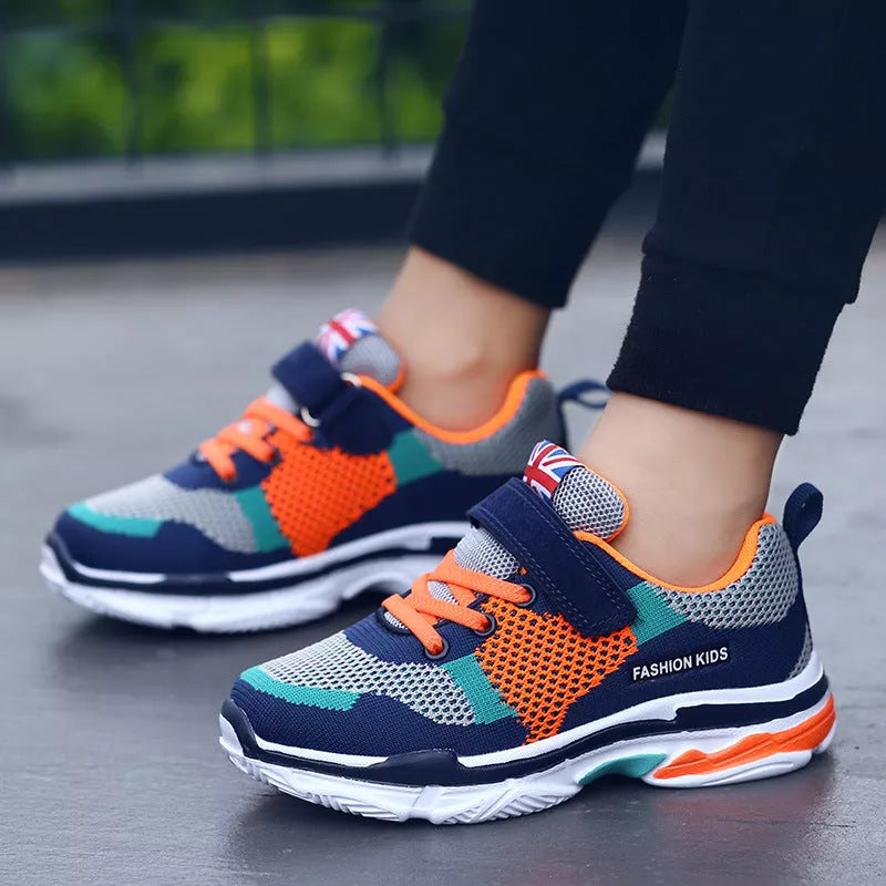 Kids' breathable mesh running shoes in pink, grey orange, and royal blue grey