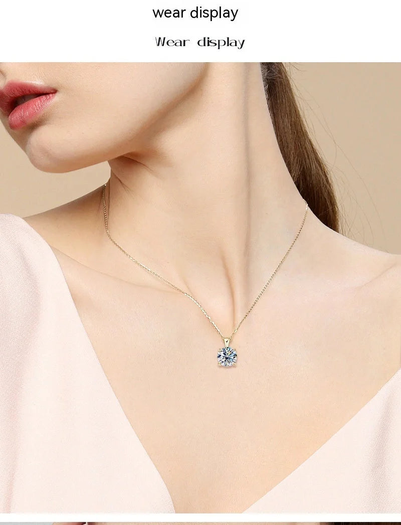 Elegant four-claw diamond necklace in silver and gold, perfect for any occasion.