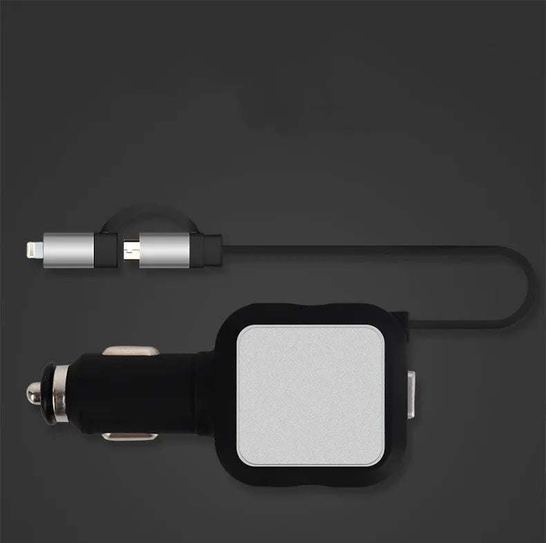 Black and gold dual USB car charger with retractable cable plugged into vehicle power socket