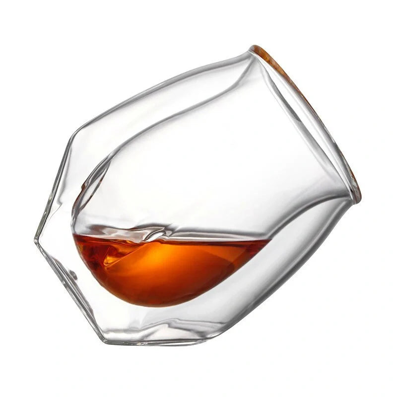 Handmade borosilicate whiskey glass with unique design and double glazing for thermal insulation
