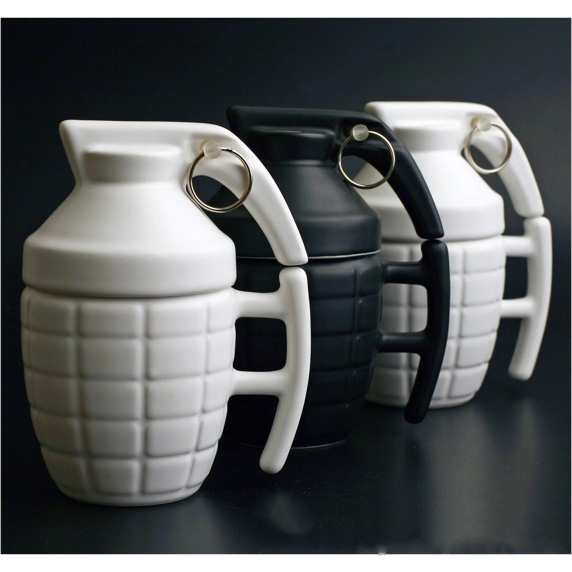 A white or black ceramic coffee mug with a grenade-inspired design and a secure lid for on-the-go convenience.
