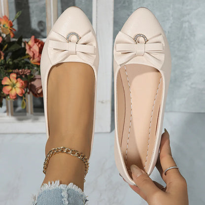 Women's beige flat casual slip-on shoes with bowknot detail and shallow mouth design