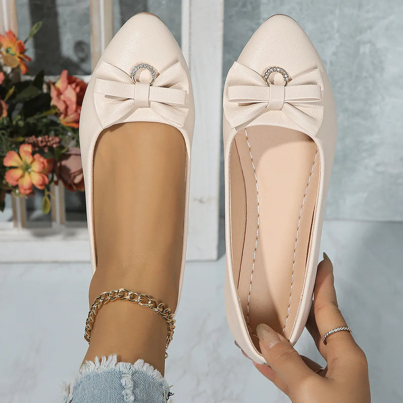 Women's flat casual slip-on lazy shoes with shallow mouth bowknot design, available in plus sizes 35-43, featuring breathable artificial PU upper, rubber sole, and round toe shape for comfortable daily wear in white, black, or beige