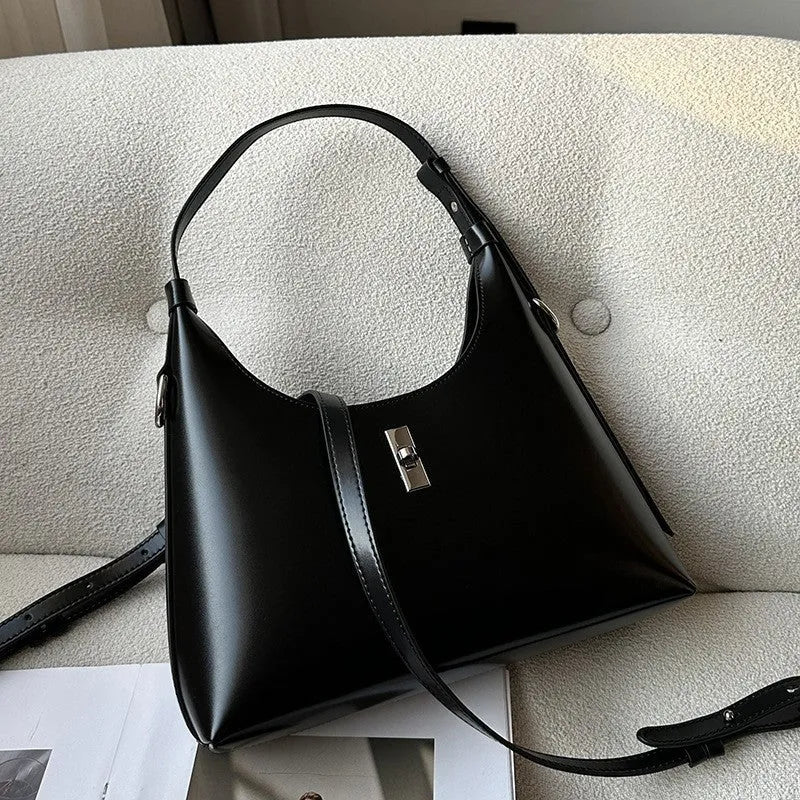 Genuine leather dumpling-shaped crossbody shoulder bag in six colour options showing sandwich pocket and internal organisation