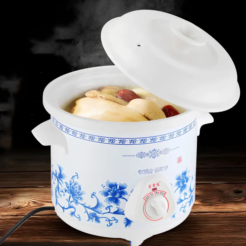 White porcelain electric stew pot with 22cm width and 1.5L capacity for automatic slow cooking