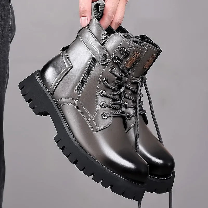 Men's light brown high-top Martin boots with side zipper and thick rubber sole on a wooden floor