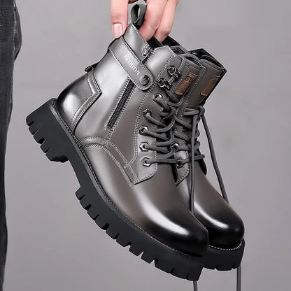 Men's light brown high-top Martin boots with side zipper and thick rubber sole on a wooden floor