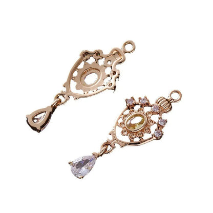 Small copper water drop pendant with zircon detailing in five colour options.