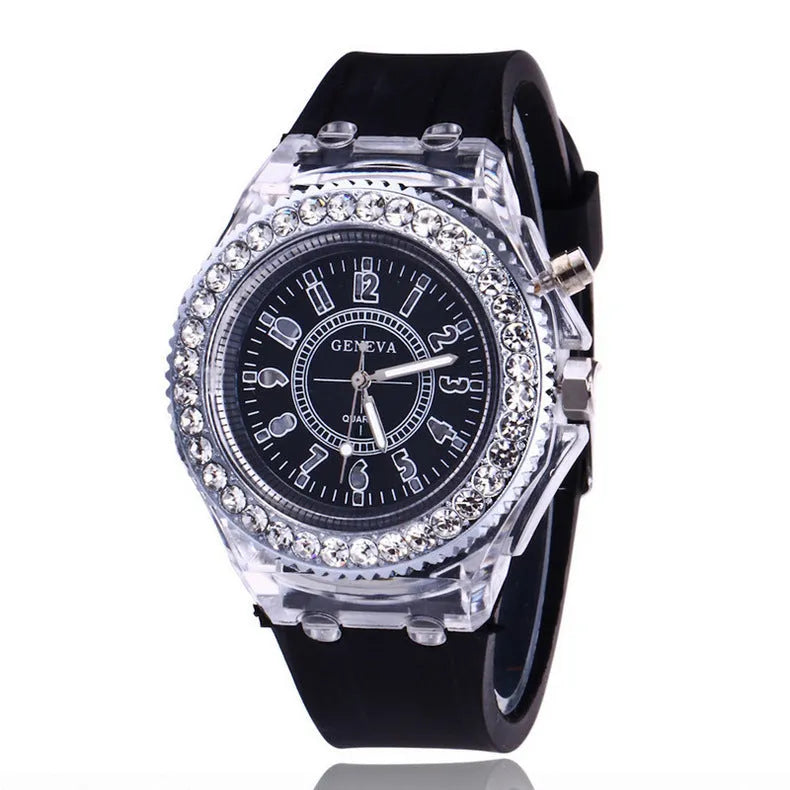 Women's LED luminous quartz watch with silicone strap and round alloy case on wrist