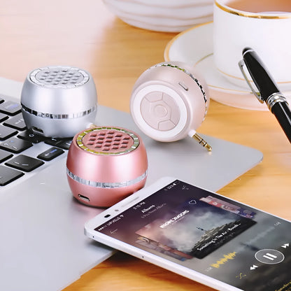 Universal external amplifier speaker in black, rose gold, and local gold colours with 5V power input.