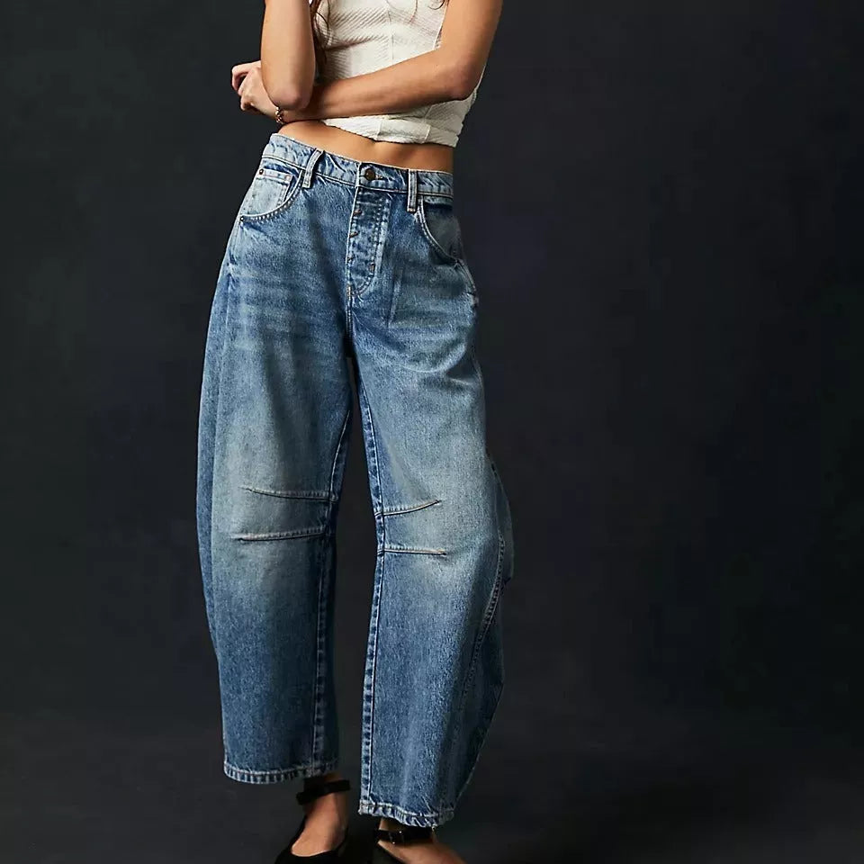 Women's mid-rise barrel jeans with wide leg design in various colors