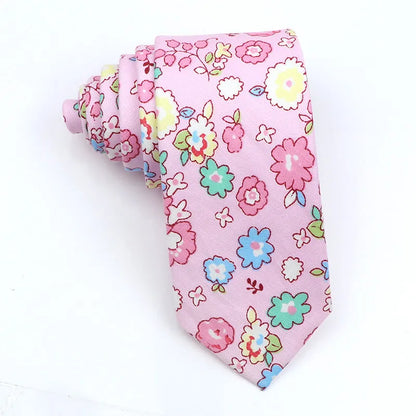A narrow Korean-style cotton bow tie featuring a cartoon print, shown in a selection of colours.