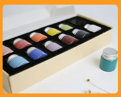 Ceramic high temperature paint pots in Lilac, Plant ash, and Verdant colours for pottery firing at 1250-1350°C