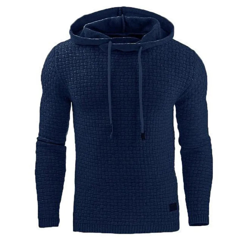 Man wearing a cotton-polyester blend hooded sweatshirt in grey, showing the front design and hood.