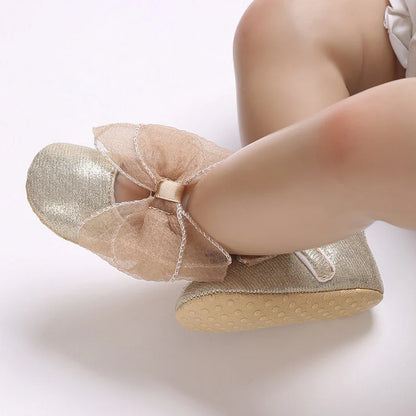 Girls' soft-soled toddler shoes with Velcro fastening in princess style, showing non-slip sole detail