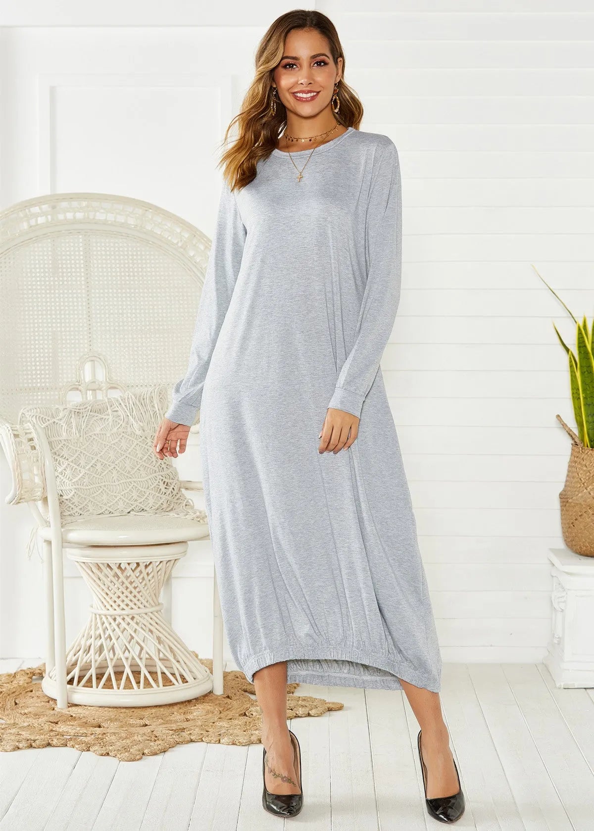 Black lantern dress with lace-up crew neck and loose fit, made from knitted polyester fabric